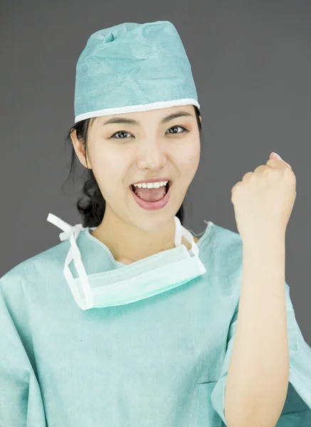 Surgeon punches fist — Stock Photo, Image