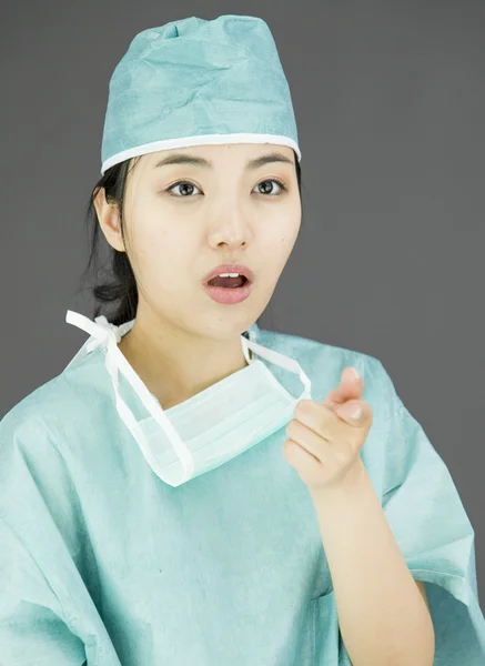 Surgeon pointing something — Stock Photo, Image