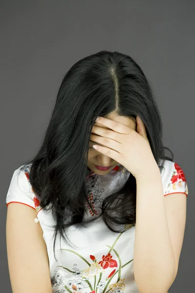 Woman hiding her face — Stock Photo, Image