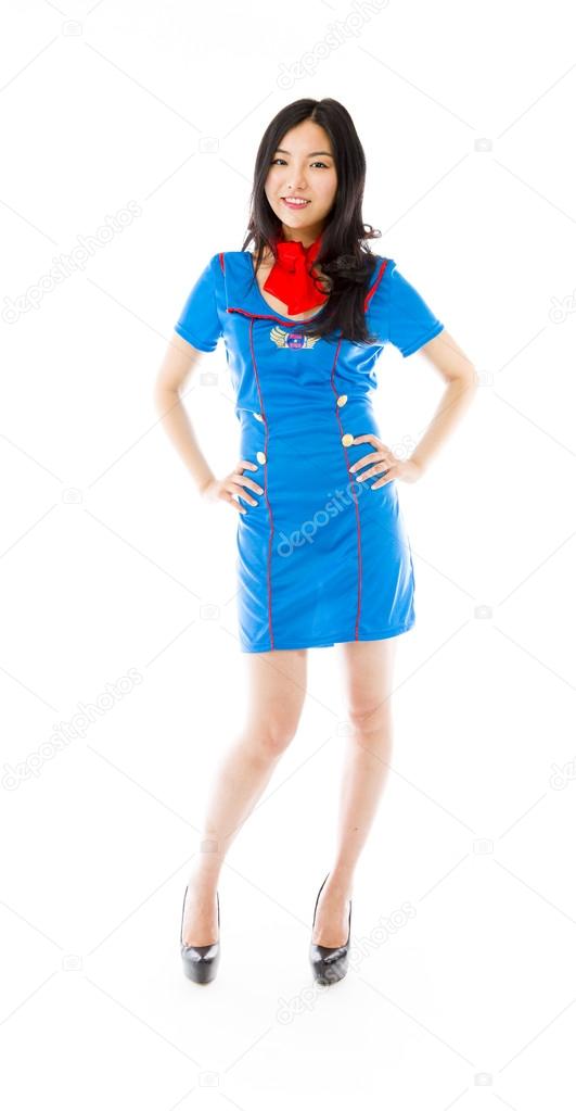 Stewardess with arms akimbo