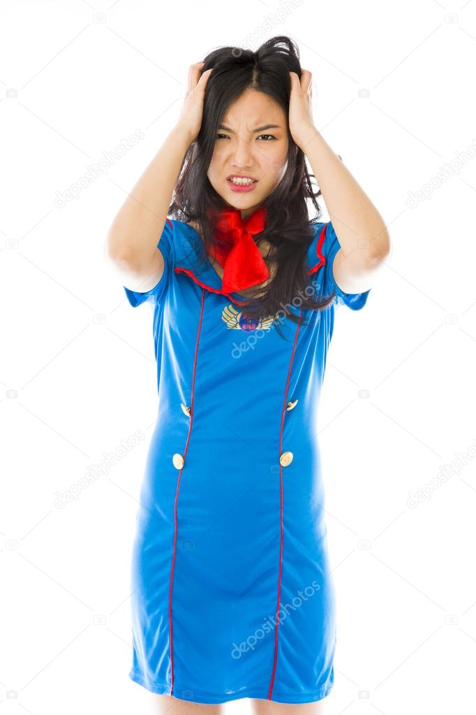 Air stewardess pulling her hair