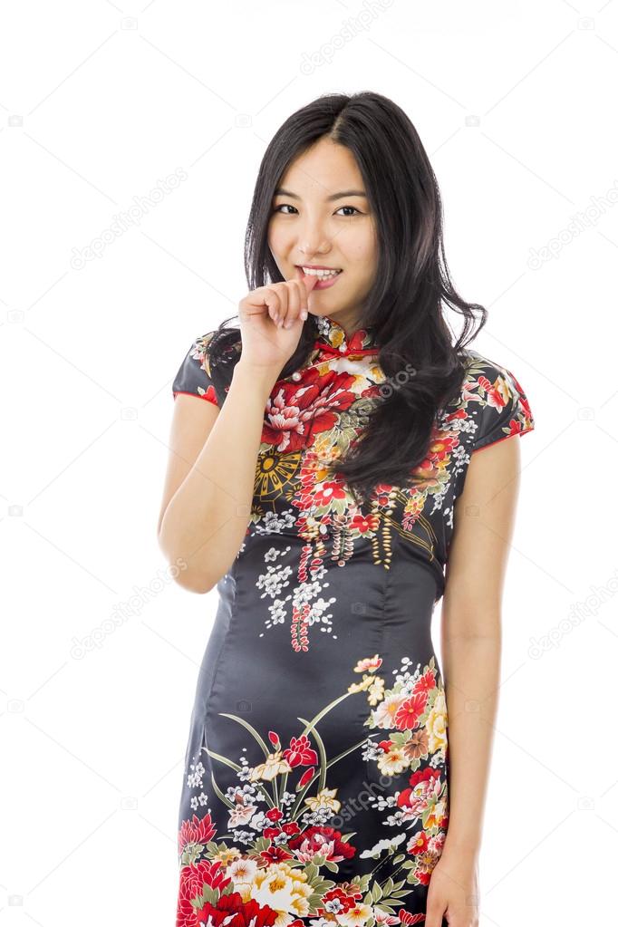 Woman with finger in mouth