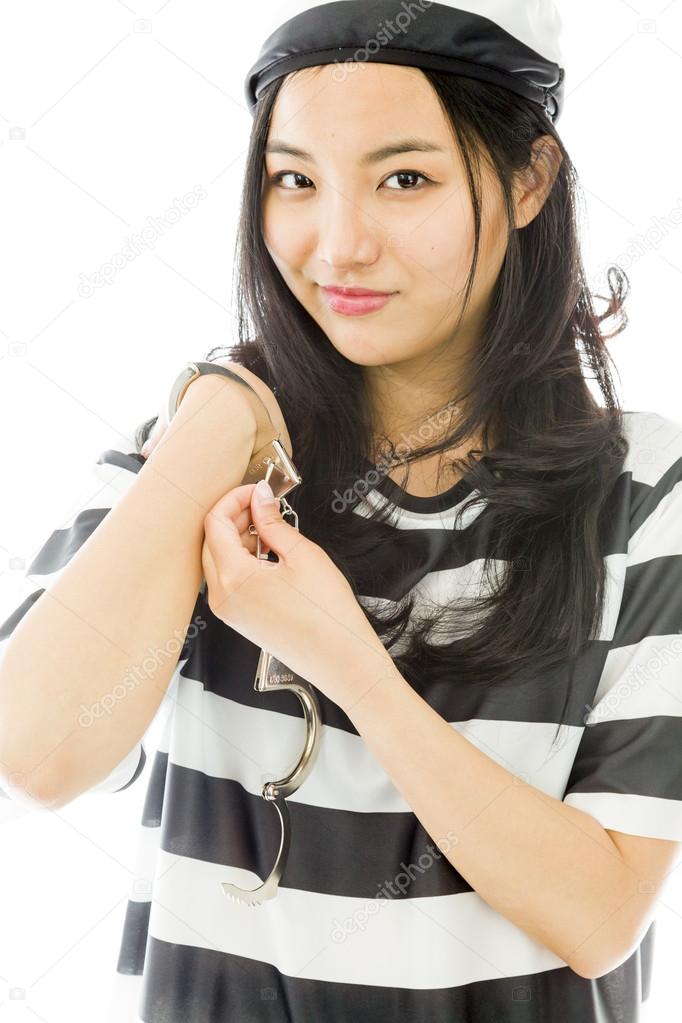 Woman opening handcuffs