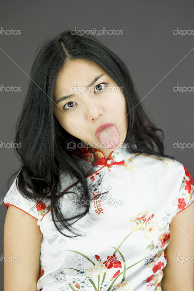 Woman poking out tongue