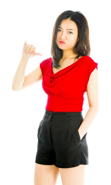 Woman standing thumb down sign — Stock Photo, Image