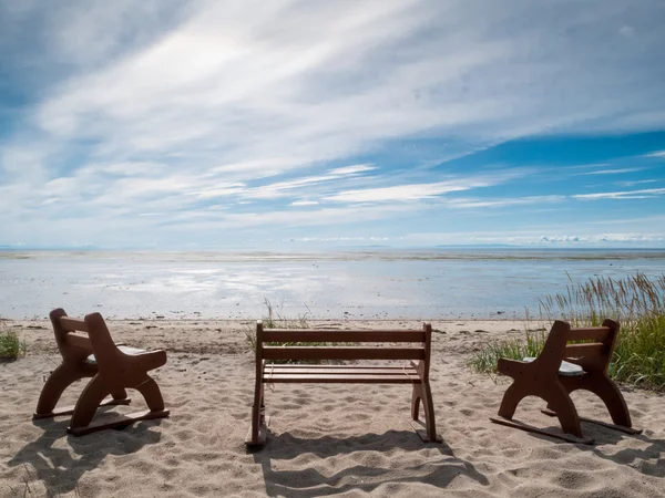 Benches on the beach — Stok fotoğraf