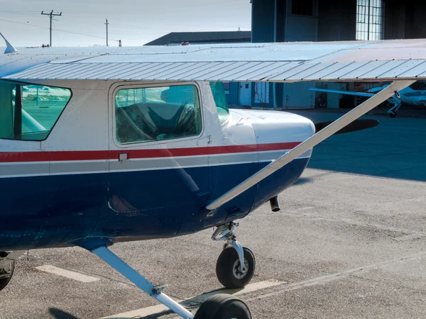 Airplane at an airport — Stock Photo, Image