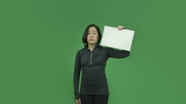 Sporty girl sad with blank sign — Stock Video