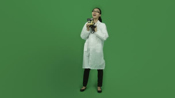 Scientist taking photography with polaroid — Stock Video