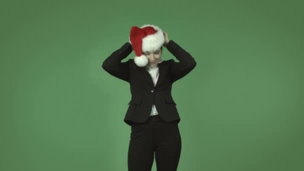 Business girl wearing chirstmas hat — Stock Video