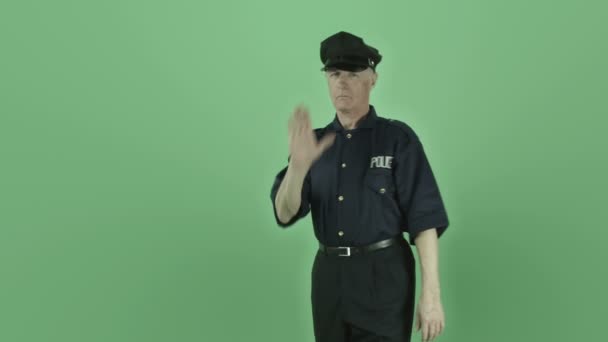 Policeman gesturing shield stop sign — Stock Video