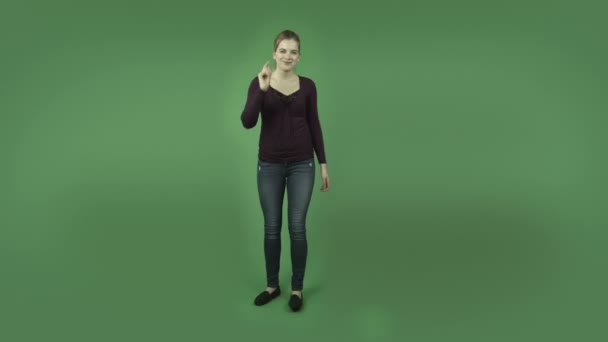 Attractive girl with call me hand sign — Stock Video