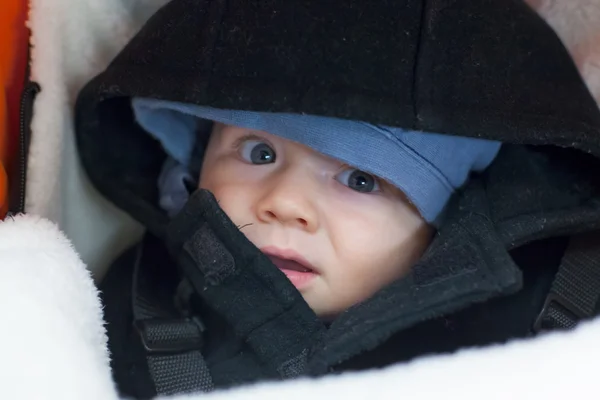 Baby boy in a baby carriage — Stock Photo, Image