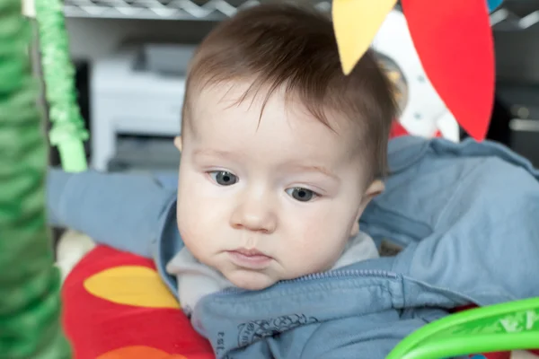 Baby boy in a baby carriage — Stock Photo, Image