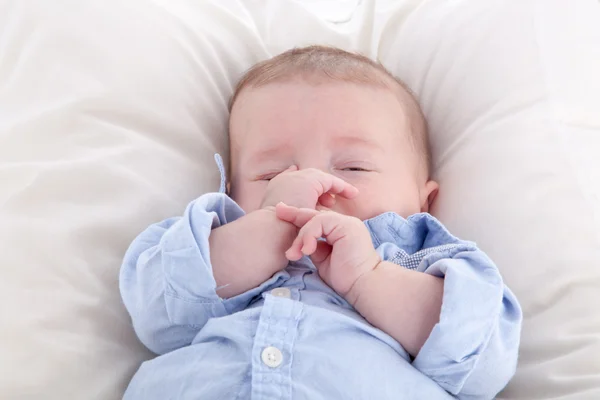 Boy sleeping on the bed — Stock Photo, Image