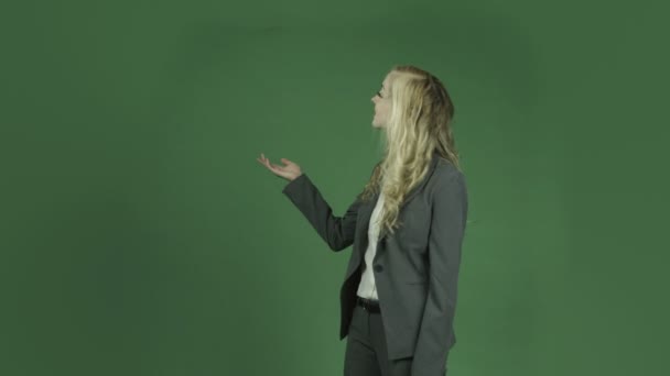 Businesswoman pointing and presenting — Stock Video