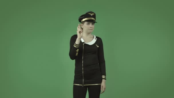 Air hostess with fingers crossed — Stock Video