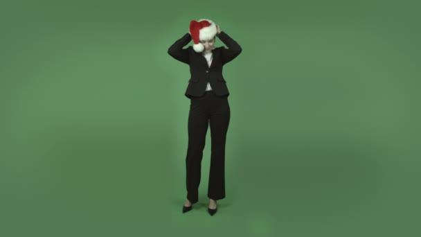 Business girl with chirstmas hat — Stock Video