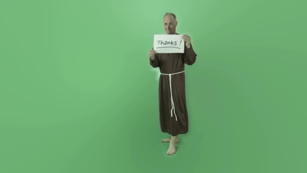 Monk holding grateful thanks sign — Stock Video