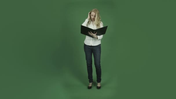 Woman reading file — Stock Video