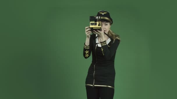 Air hostess with camera polaroid — Stock Video