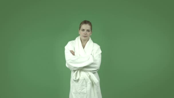 Girl in bathrobe worried — Stock Video