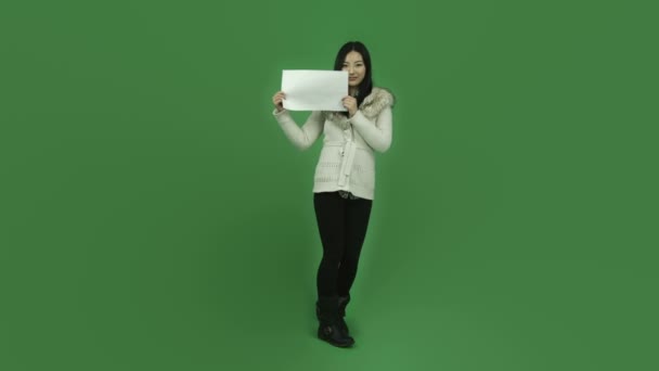 Asian girl holding blank sign — Stock Video