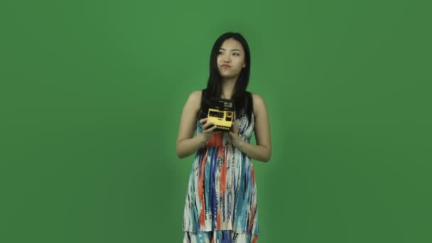 Girl taking photography on polaroid — Stock Video