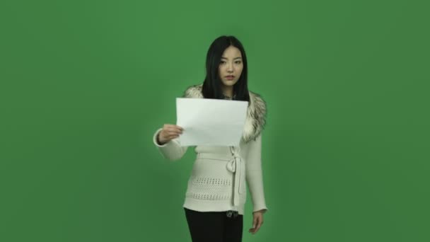 Girl is upset with blank sign — Stock Video