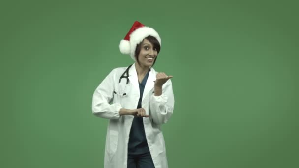 Indian female doctor in christmas hat — Stock Video