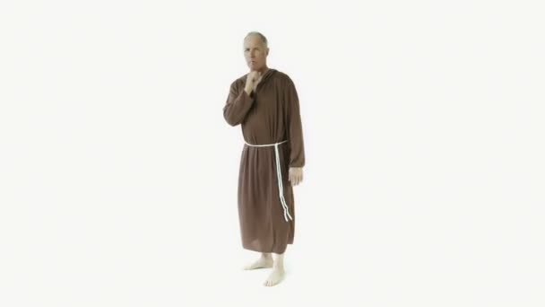 Monk showing silence sign