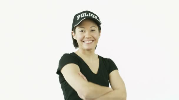 Police woman smiling with arms crossed — Stock Video