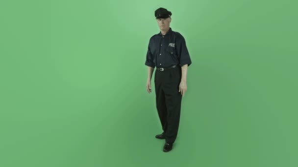 Policeman with fingers crossed for luck — Stock Video