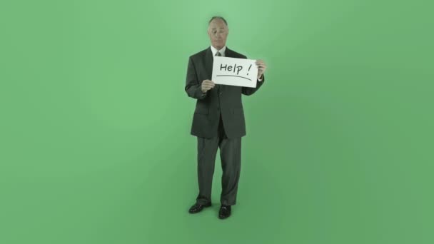 Businessman  holding help sign — Stock Video