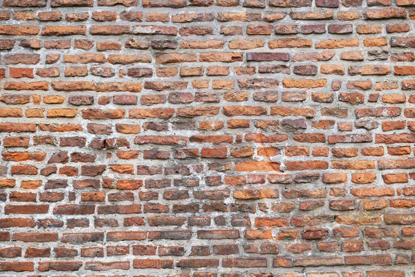 Rode baksteen muur achtergrond. — Stockfoto