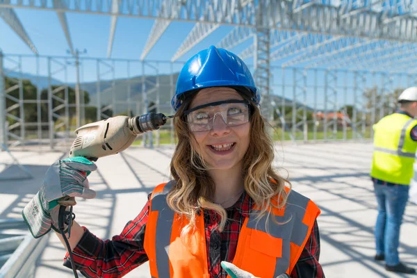 Cheerful Construction Worker Smiling Camera While Sitting Beautiful Young Woman — Stock Photo, Image