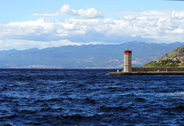 Choppy Wavy Blue Sea Surface Small Lighthouse Waterfront Background — Fotografia de Stock
