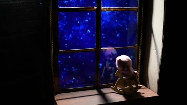 Toy Baby Rocking Chair Background Starry Sky Window Night — Stock Video