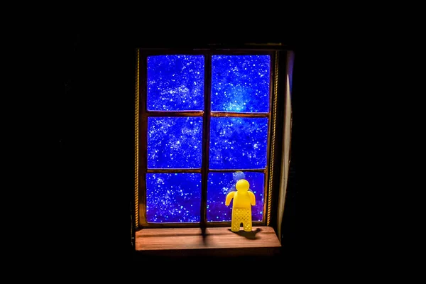 Little Silicone Man Looks Stars Window — Stock Photo, Image