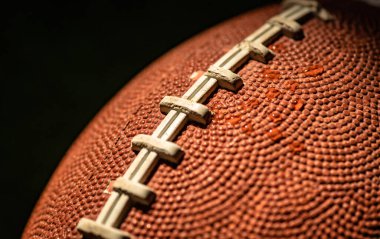 Arka plan olarak Amerikan futbol topu dokusu