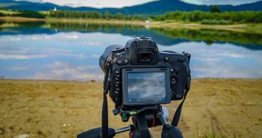 Shooting a landscape of a mountain lake