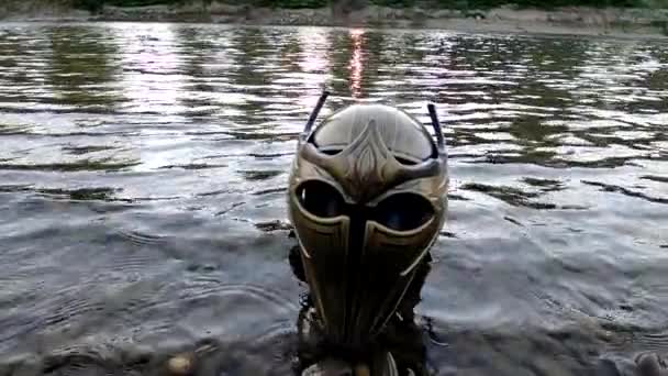 Metaphorical Installation Mountain River Gladiatorial Helmet — стоковое видео