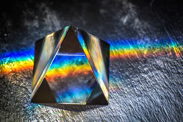 The crystal pyramid  in the rays of light