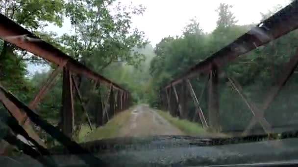 Road Vehicle Rides Iron Bridge Mountain River Rain — Wideo stockowe