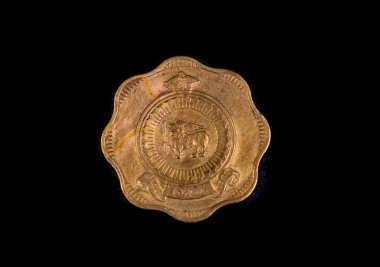 1965 'te yayınlanan 10 sentlik Seylan madeni parasının tersi.