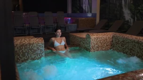 Beautiful Young Woman White Stylish Swimwear Resting Cozy Hot Tub — Stock Video