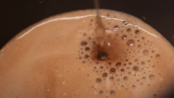 Close up hot coffee flowing to cup from coffee machine — Stock Video