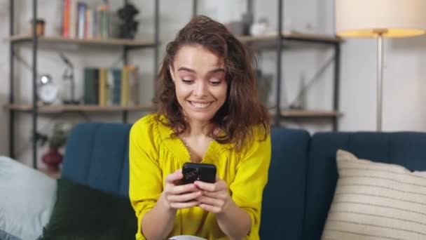 Excited Young Woman Looking Phone Screen Celebrating Good News Showing — Vídeos de Stock