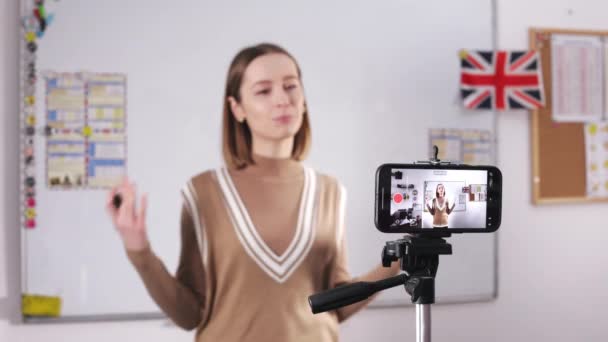 Foreign Language Tutor Filming Video Smartphone Upload Social Networks Woman — 图库视频影像