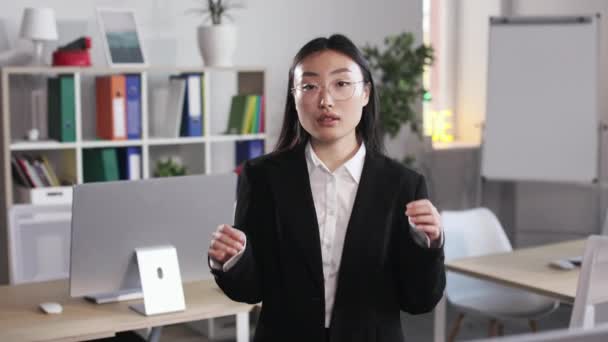 Confident Female Manager Stylish Black Suit Adjusting Eyewear While Standing — Vídeo de Stock